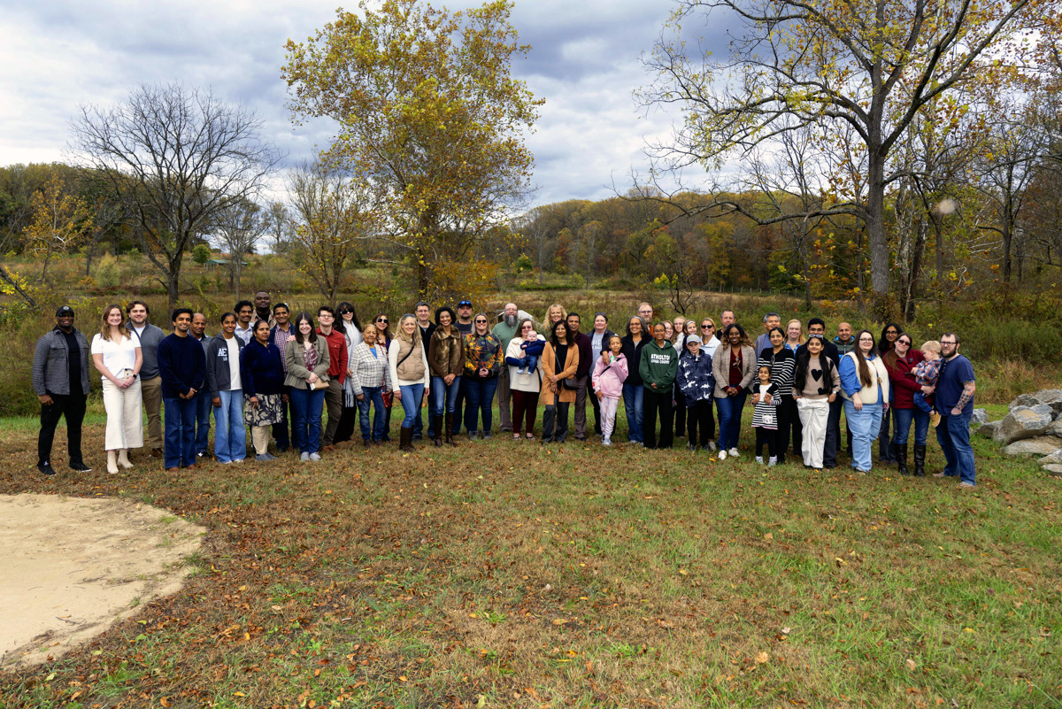 apvit team posing for a pic at a park