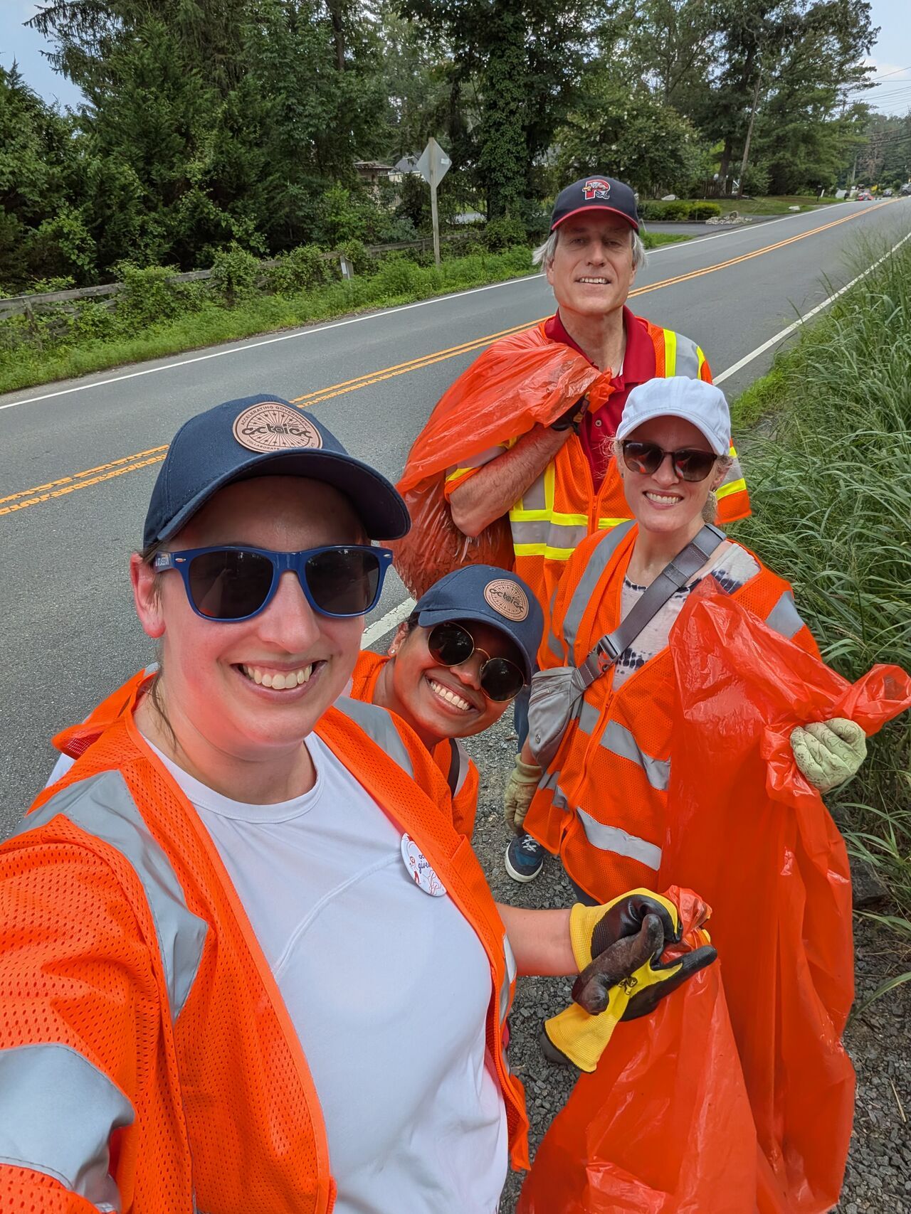 apvit team wearing orange vest